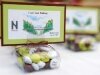 Party favors line the table at the bridge opening ceremony. - By Adam Eschbach
