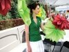 Special Events Producer Jules Maas takes down paper flowers she specially made for the ceremony. - By Adam Eschbach
