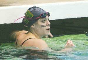 swim-hhs-kaufman-20081115 Lauren Kaufman, a sophomore at Hazen High School, looks up for her time as she finishes third in the 50-yard freestyle and later fifth in the 100-yard freestyle event at the state 3A championship last month at the King County Aquatics Center in Federal Way. Photo by Greg Farrar
