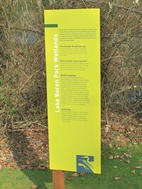 city-signs-newc-20090221 This prototype of a the new signs was installed last fall near the public dock at Lake Boren Park.