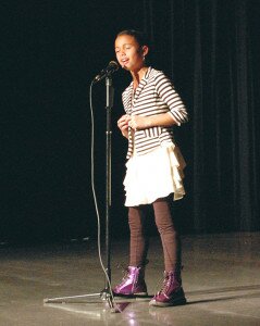 By Christina Corrales-Toy Hazelwood Elementary School student Jade Hopkins does her best Alicia Keys impression, belting out the singer’s ‘Girl on Fire’ at the school’s talent show.
