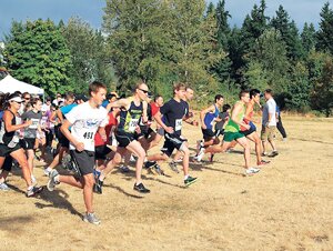 File Runners take off as the Newcastle 5K Run/Walk begins last September at Lake Boren Park.