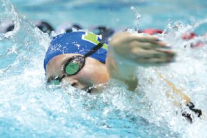 By Greg Farrar Senior Mackenna Briggs slices through the water en route to winning the 50-yard freestyle 2A state championship in a time of 23.78 seconds.